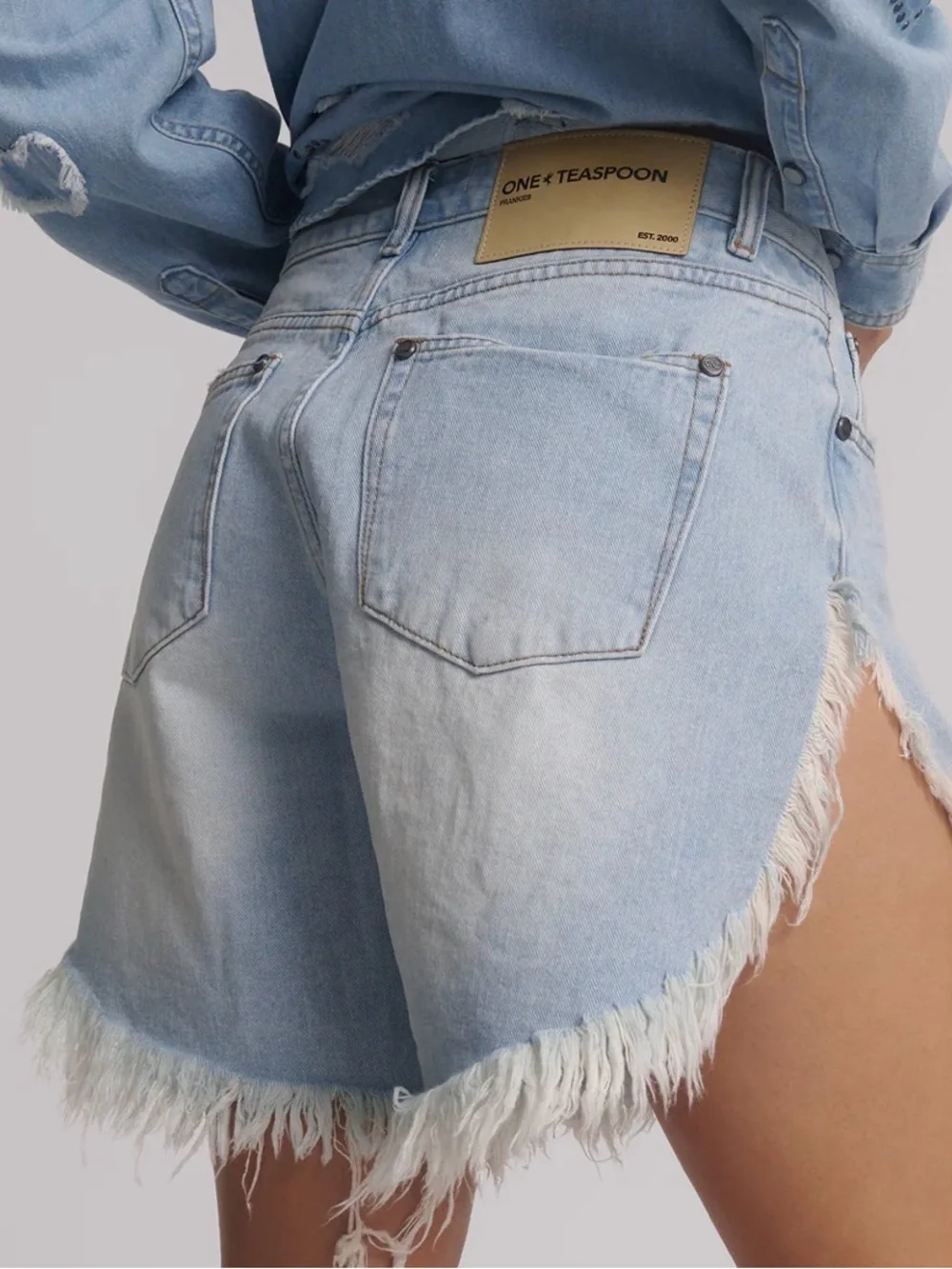 One Teaspoon Frankie Pale Blue Distressed V-Hem Denim Shorts